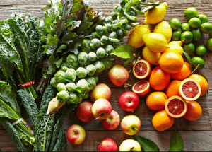 a group of fruits and vegetables on a wood surface Healthy Weight Loss Diets Harlow